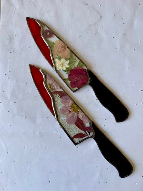 Two Stained Glass Knives with flowers encased