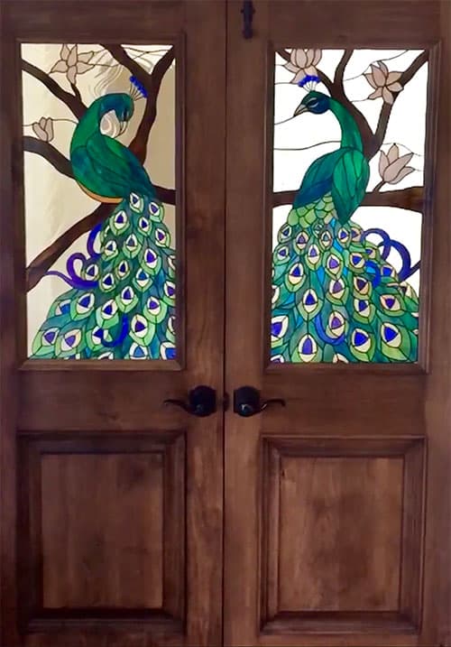 Peacock stained glass double door panels by Allen Kenoyer Glass