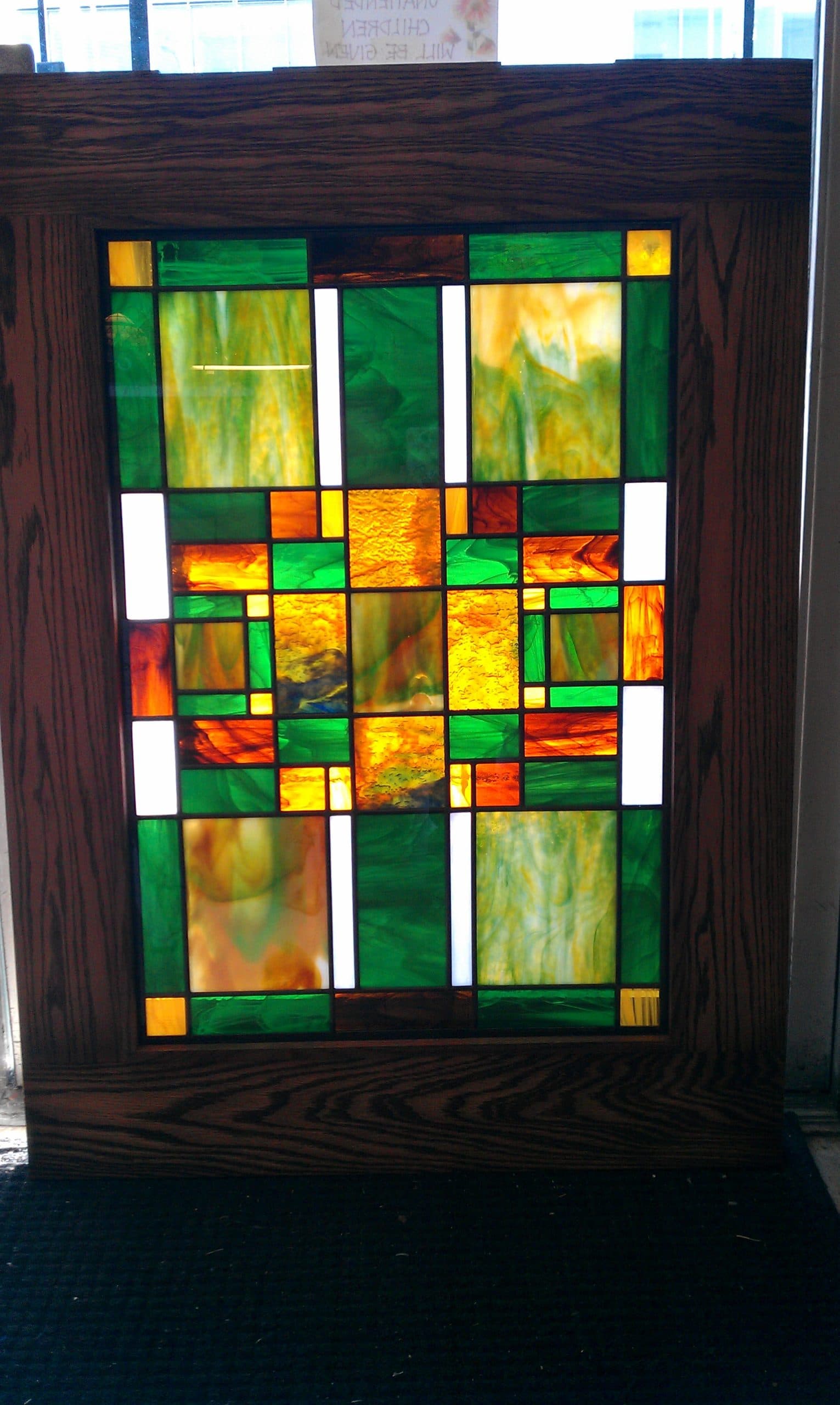 Green floral stained glass panel