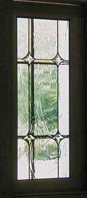 Custom stained glass window installed in a home