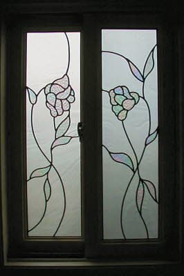 Iridescent stained glass flower panel